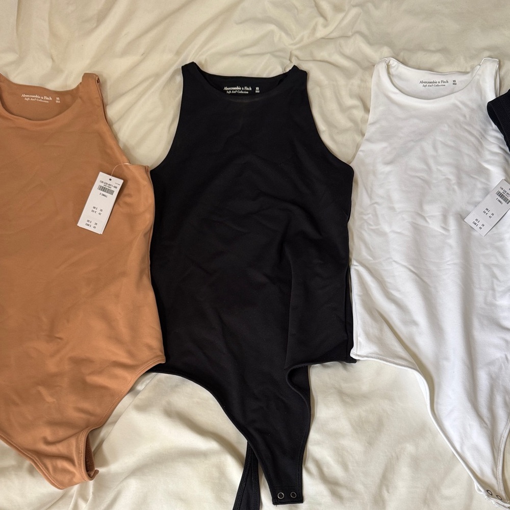 Abercrombie & Fitch Bodysuits in Tan, Black, and White